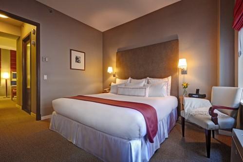 Our Classic King Suite offers privacy with a fully locking door between the bedroom and living room area.