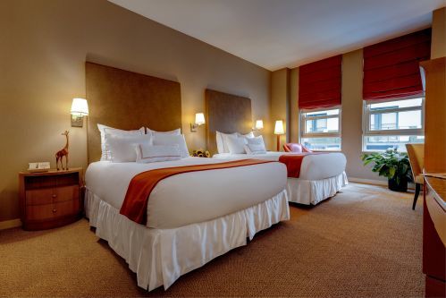 Our Guestroom with two Queen beds  gives travelers their own space when staying with friends or family.